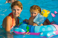 mom and girl in pool